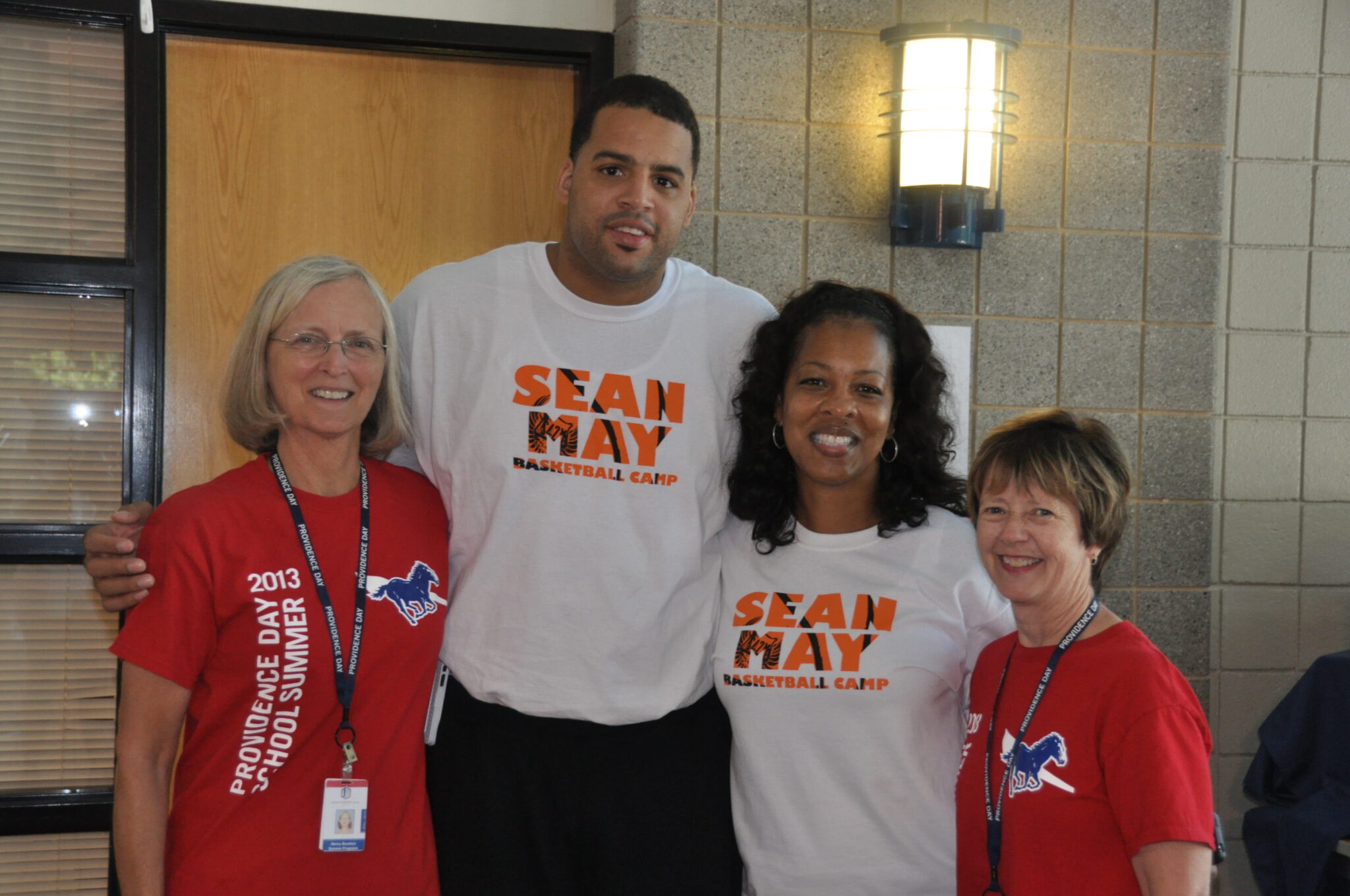 Four individuals that lead the Sean May Basketball Camp