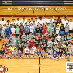 A group photo of members of the Champions BasketballCamp